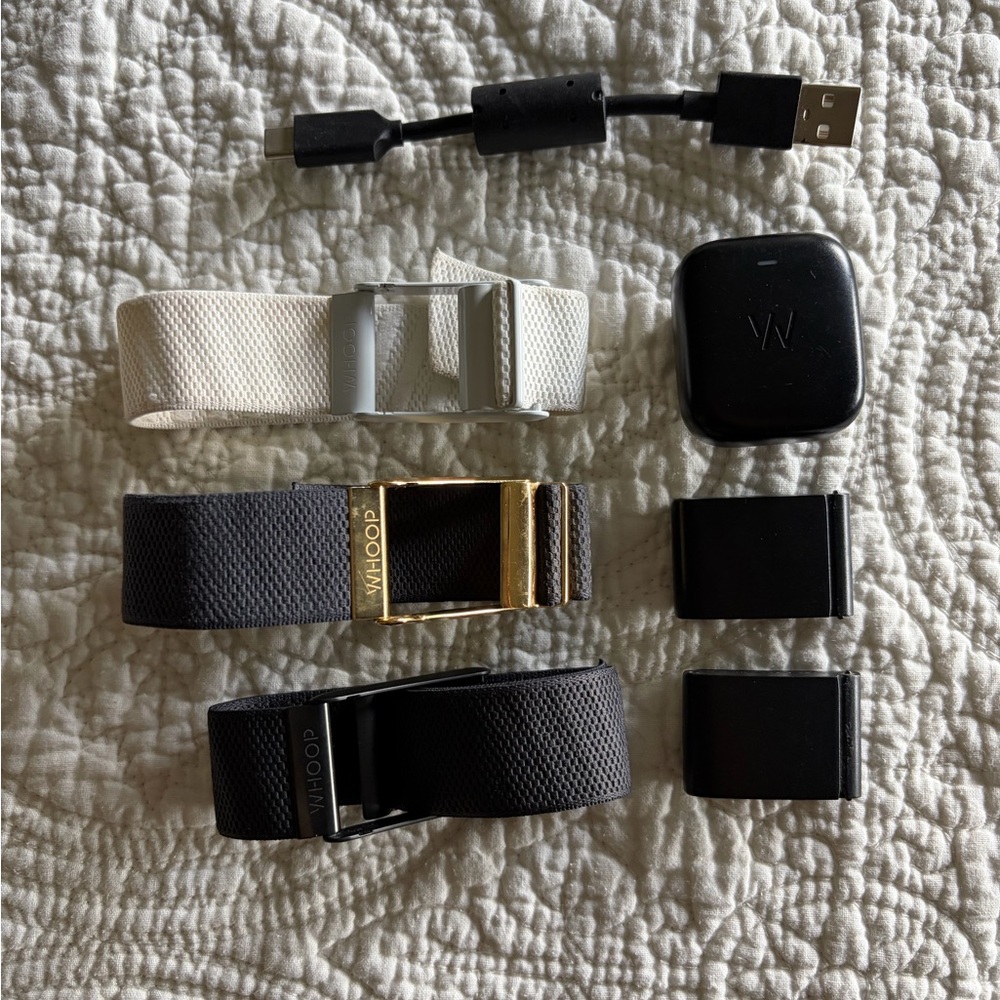 2 WHOOP 4.0s w/ Replacement Bands & Charger Kit - Black, White, Gold